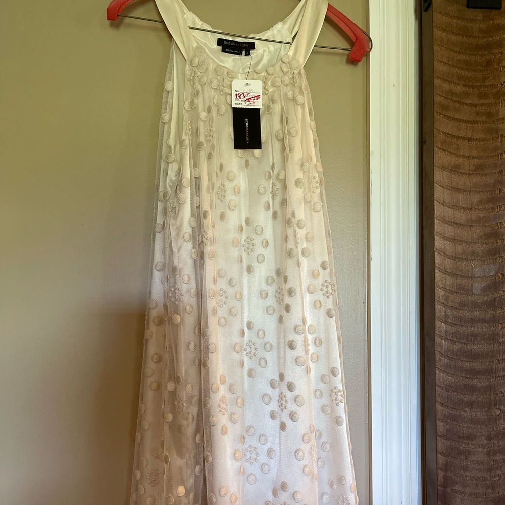 Bcbg white/cream dress, size small, never been worn, new w tags. Smoke free home